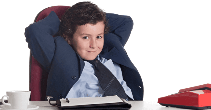 Young boy in a business suit