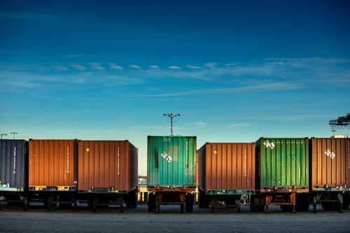 Containers on trucks waiting to be shipped