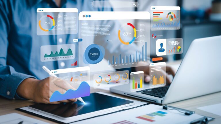 An analyst uses a computer and dashboard for data business analysis and Data Management System with KPI and metrics connected to the database for technology finance, operations, sales, marketing