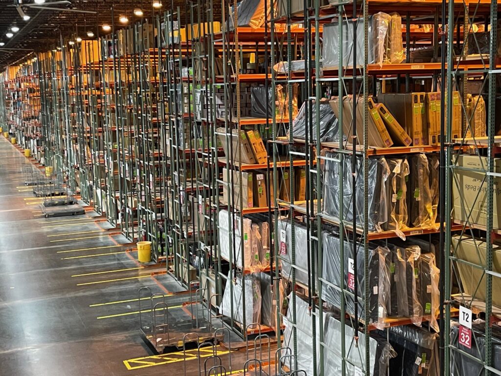Warehouse racking operations in a furniture store warehouse