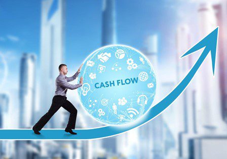 Graphic depicting a man rolling a ball that says Cash Flow up an arrow.